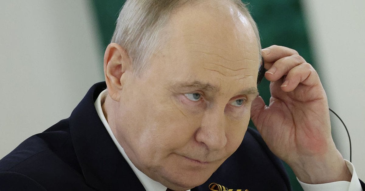 Путін